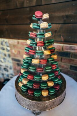 Jewelled tones, lawn games & axe throwing for this White Hart, Great Yeldham wedding. Best Essex Suffolk documentary wedding photographer