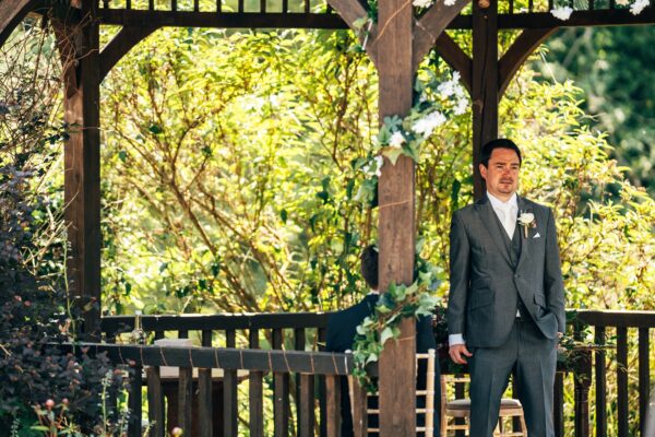 Jewelled tones, lawn games & axe throwing for this White Hart, Great Yeldham wedding. Best Essex Suffolk documentary wedding photographer