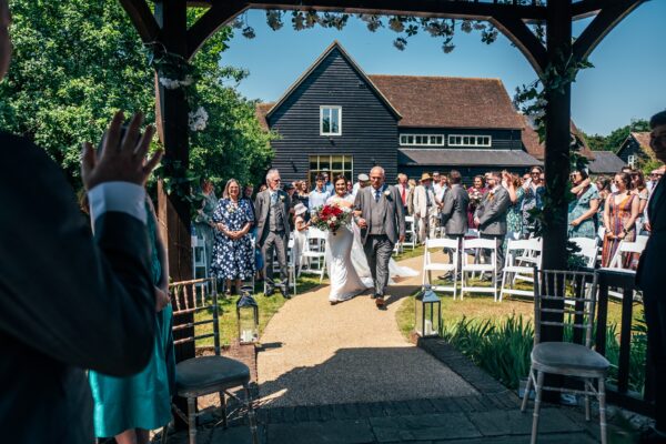 Jewelled tones, lawn games & axe throwing for this White Hart, Great Yeldham wedding. Best Essex Suffolk documentary wedding photographer