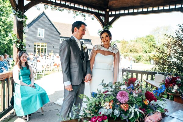 Jewelled tones, lawn games & axe throwing for this White Hart, Great Yeldham wedding. Best Essex Suffolk documentary wedding photographer