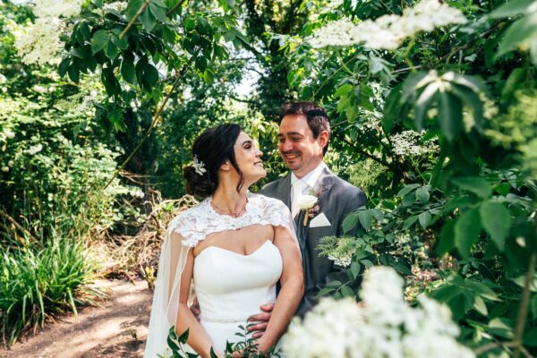 Bride and Groom portrait in gardens White Hart Great Yeldham