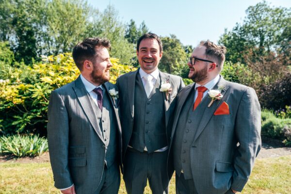 Jewelled tones, lawn games & axe throwing for this White Hart, Great Yeldham wedding. Best Essex Suffolk documentary wedding photographer