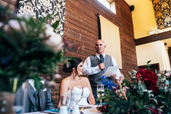 Jewelled tones, lawn games & axe throwing for this White Hart, Great Yeldham wedding. Best Essex Suffolk documentary wedding photographer