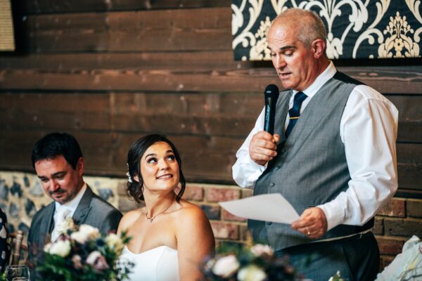 Jewelled tones, lawn games & axe throwing for this White Hart, Great Yeldham wedding. Best Essex Suffolk documentary wedding photographer