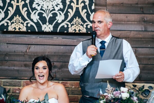 Jewelled tones, lawn games & axe throwing for this White Hart, Great Yeldham wedding. Best Essex Suffolk documentary wedding photographer