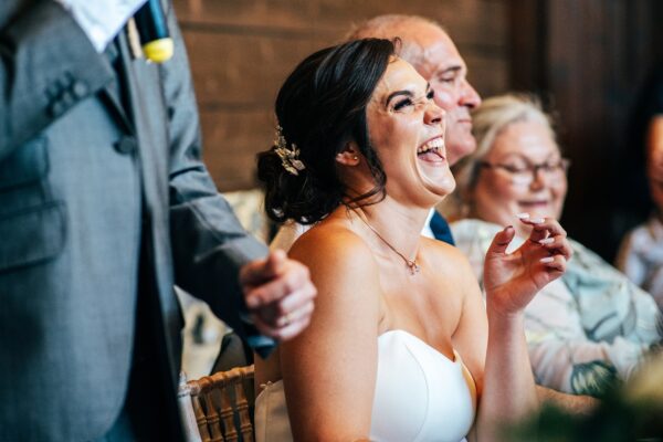 Jewelled tones, lawn games & axe throwing for this White Hart, Great Yeldham wedding. Best Essex Suffolk documentary wedding photographer