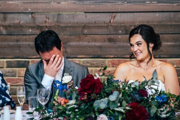 Jewelled tones, lawn games & axe throwing for this White Hart, Great Yeldham wedding. Best Essex Suffolk documentary wedding photographer