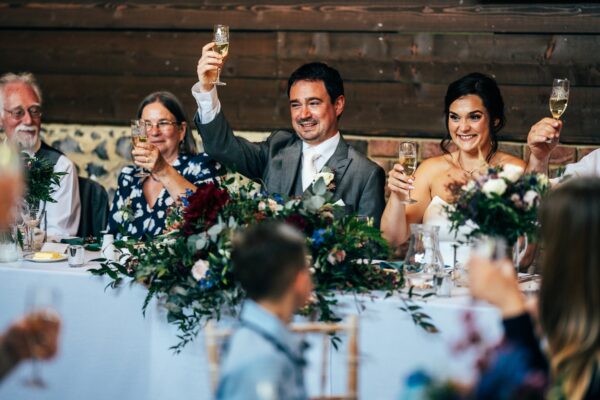 Jewelled tones, lawn games & axe throwing for this White Hart, Great Yeldham wedding. Best Essex Suffolk documentary wedding photographer