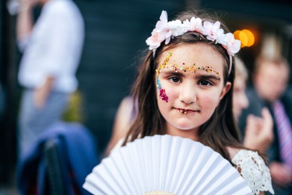 Jewelled tones, lawn games & axe throwing for this White Hart, Great Yeldham wedding. Best Essex Suffolk documentary wedding photographer