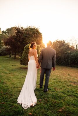 Jewelled tones, lawn games & axe throwing for this White Hart, Great Yeldham wedding. Best Essex Suffolk documentary wedding photographer