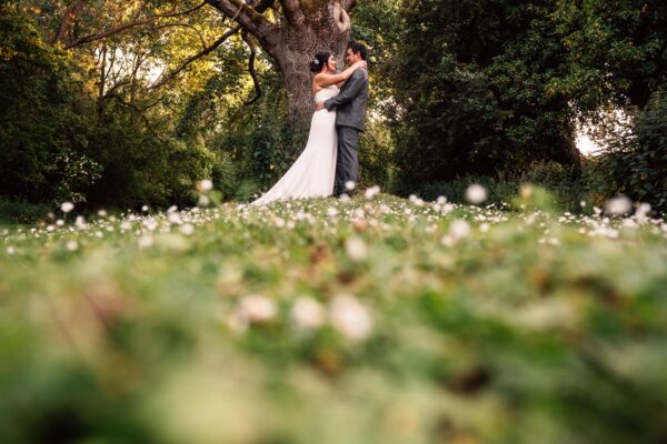 Jewelled tones, lawn games & axe throwing for this White Hart, Great Yeldham wedding. Best Essex Suffolk documentary wedding photographer