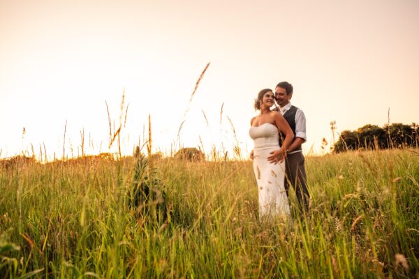 Jewelled tones, lawn games & axe throwing for this White Hart, Great Yeldham wedding. Best Essex Suffolk documentary wedding photographer