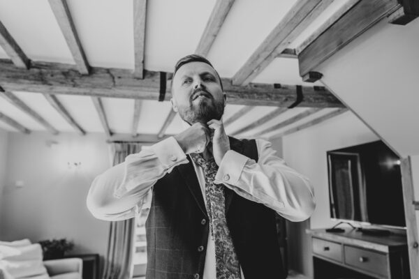 Spring pastels and a rainbow for an intimate wedding at Tuffon Hall Vineyard. Essex Documentary Wedding Photographer