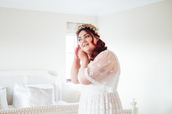 Spring pastels and a rainbow for an intimate wedding at Tuffon Hall Vineyard. Essex Documentary Wedding Photographer