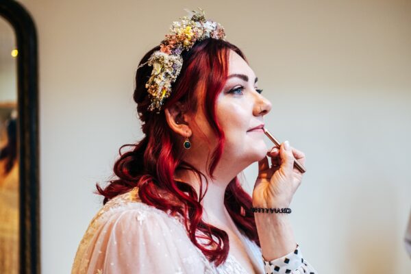 Spring pastels and a rainbow for an intimate wedding at Tuffon Hall Vineyard. Essex Documentary Wedding Photographer