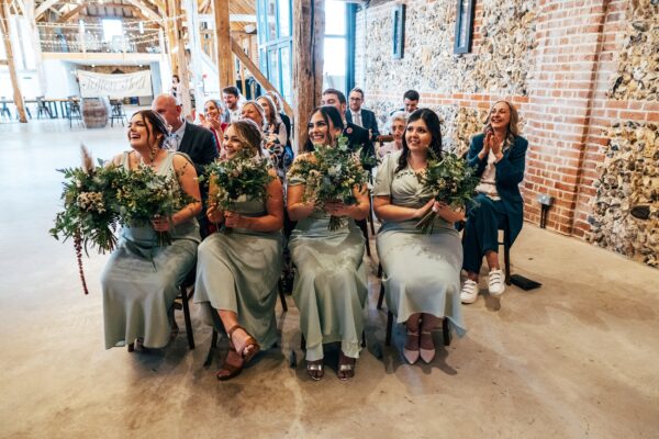 Spring pastels and a rainbow for an intimate wedding at Tuffon Hall Vineyard. Essex Documentary Wedding Photographer