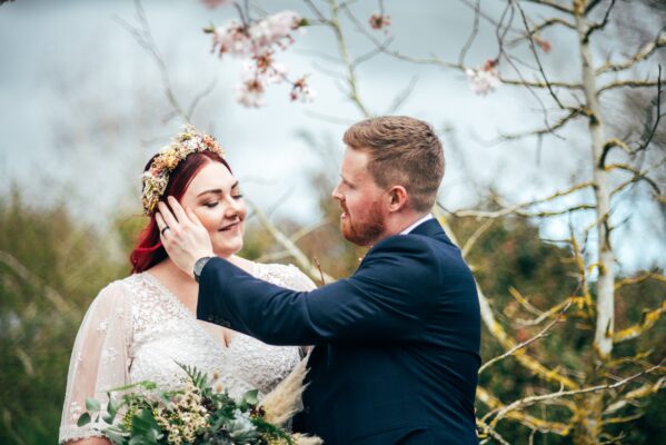 Spring pastels and a rainbow for an intimate wedding at Tuffon Hall Vineyard. Essex Documentary Wedding Photographer