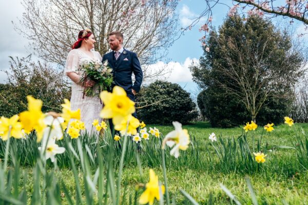 Spring pastels and a rainbow for an intimate wedding at Tuffon Hall Vineyard. Essex Documentary Wedding Photographer