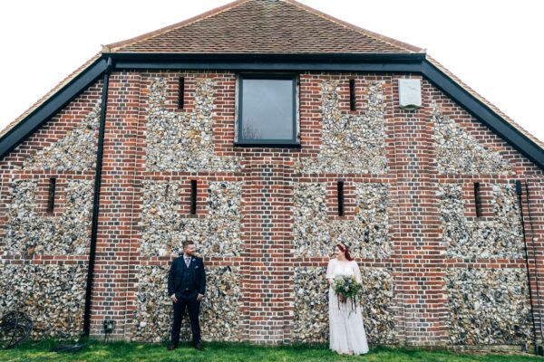 Spring pastels and a rainbow for an intimate wedding at Tuffon Hall Vineyard. Essex Documentary Wedding Photographer