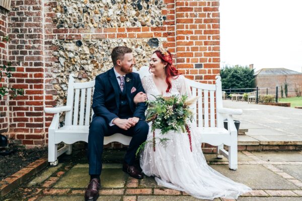 Spring pastels and a rainbow for an intimate wedding at Tuffon Hall Vineyard. Essex Documentary Wedding Photographer