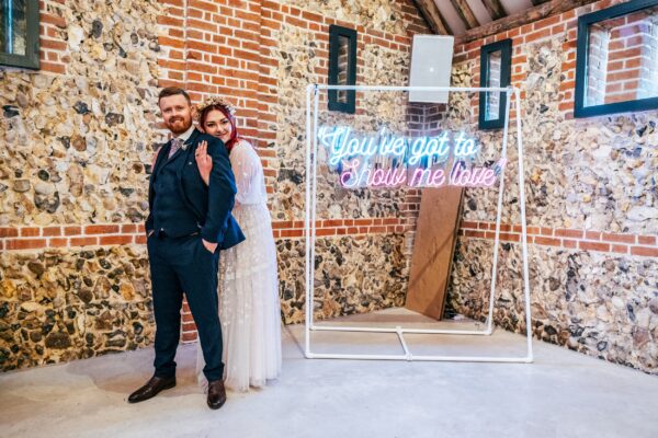 Spring pastels and a rainbow for an intimate wedding at Tuffon Hall Vineyard. Essex Documentary Wedding Photographer