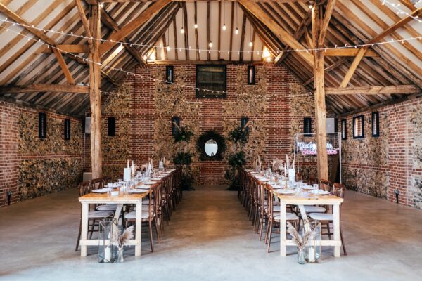 Spring pastels and a rainbow for an intimate wedding at Tuffon Hall Vineyard. Essex Documentary Wedding Photographer