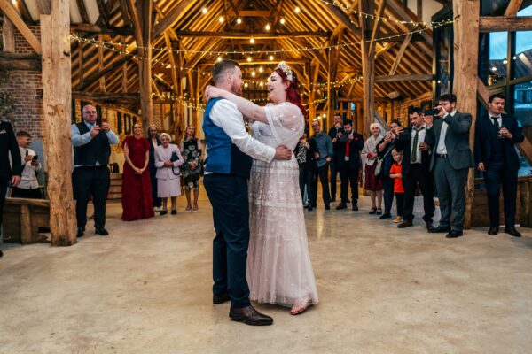 Spring pastels and a rainbow for an intimate wedding at Tuffon Hall Vineyard. Essex Documentary Wedding Photographer