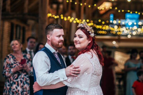 Spring pastels and a rainbow for an intimate wedding at Tuffon Hall Vineyard. Essex Documentary Wedding Photographer