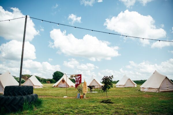 Spring brights & black tie for rustic glamour at The Barns at Lodge Farm. Essex documentary wedding photographer