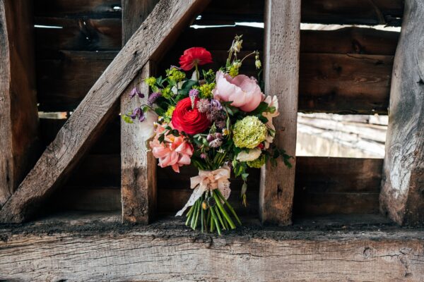 Spring brights & black tie for rustic glamour at The Barns at Lodge Farm. Essex documentary wedding photographer