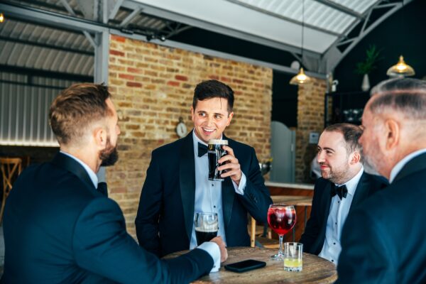 Spring brights & black tie for rustic glamour at The Barns at Lodge Farm. Essex documentary wedding photographer