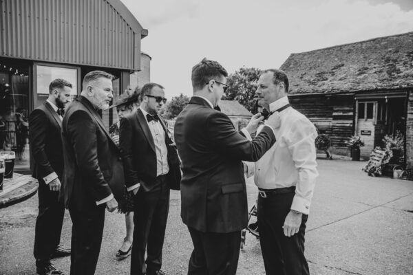 Spring brights & black tie for rustic glamour at The Barns at Lodge Farm. Essex documentary wedding photographer