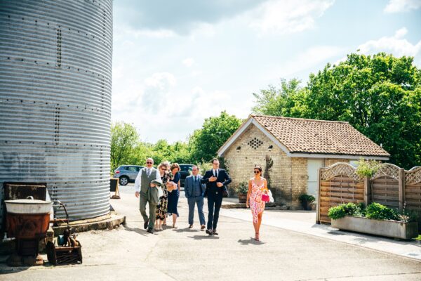 Spring brights & black tie for rustic glamour at The Barns at Lodge Farm. Essex documentary wedding photographer