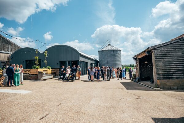 Spring brights & black tie for rustic glamour at The Barns at Lodge Farm. Essex documentary wedding photographer