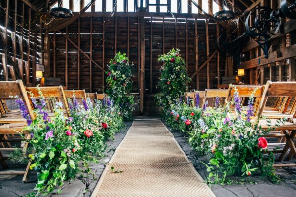 Spring brights & black tie for rustic glamour at The Barns at Lodge Farm. Essex documentary wedding photographer