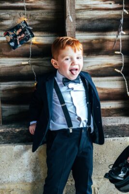 Spring brights & black tie for rustic glamour at The Barns at Lodge Farm. Essex documentary wedding photographer