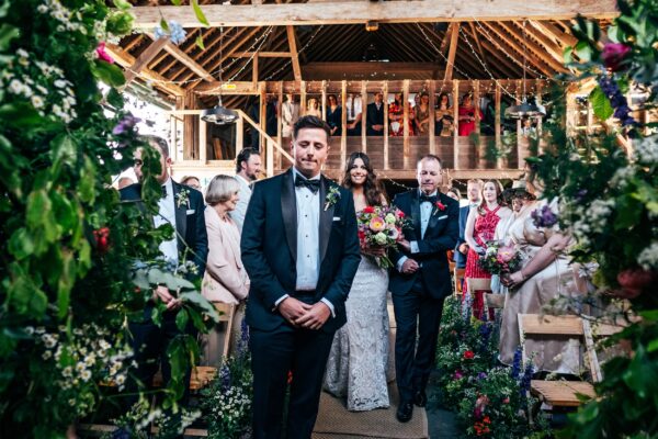 Spring brights & black tie for rustic glamour at The Barns at Lodge Farm. Essex documentary wedding photographer