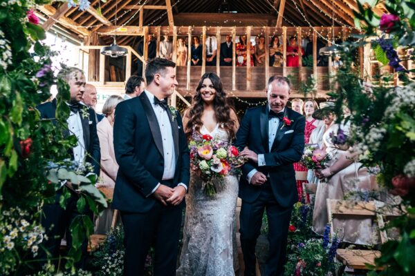 Spring brights & black tie for rustic glamour at The Barns at Lodge Farm. Essex documentary wedding photographer