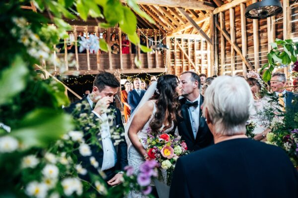 Spring brights & black tie for rustic glamour at The Barns at Lodge Farm. Essex documentary wedding photographer