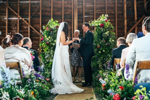 Spring brights & black tie for rustic glamour at The Barns at Lodge Farm. Essex documentary wedding photographer