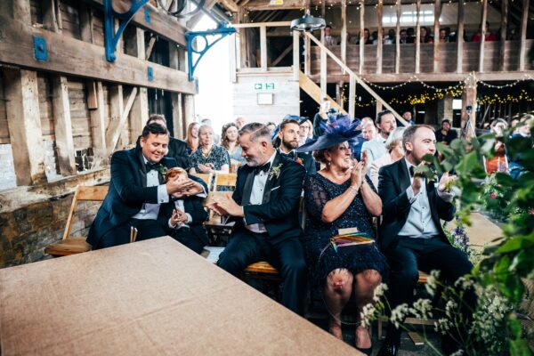 Spring brights & black tie for rustic glamour at The Barns at Lodge Farm. Essex documentary wedding photographer