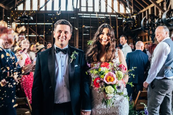 Spring brights & black tie for rustic glamour at The Barns at Lodge Farm. Essex documentary wedding photographer