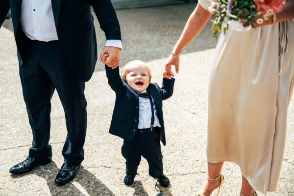 Spring brights & black tie for rustic glamour at The Barns at Lodge Farm. Essex documentary wedding photographer