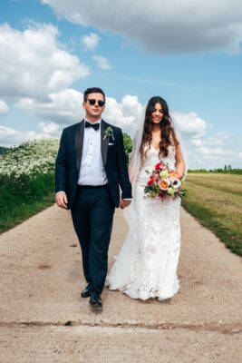 Spring brights & black tie for rustic glamour at The Barns at Lodge Farm. Essex documentary wedding photographer