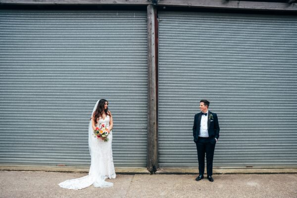 Spring brights & black tie for rustic glamour at The Barns at Lodge Farm. Essex documentary wedding photographer