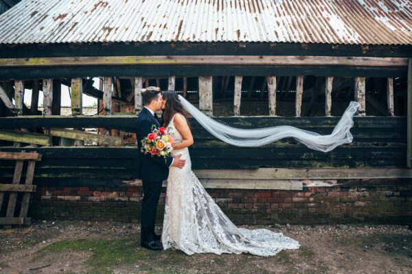 Spring brights & black tie for rustic glamour at The Barns at Lodge Farm. Essex documentary wedding photographer