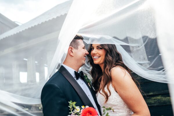 Spring brights & black tie for rustic glamour at The Barns at Lodge Farm. Essex documentary wedding photographer