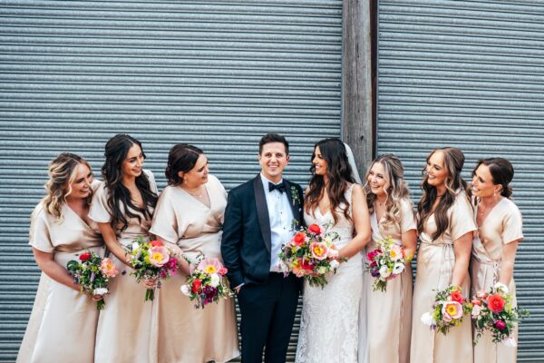 Spring brights & black tie for rustic glamour at The Barns at Lodge Farm. Essex documentary wedding photographer