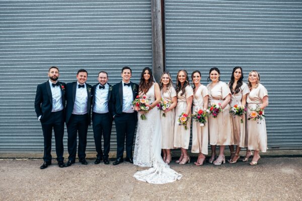 Spring brights & black tie for rustic glamour at The Barns at Lodge Farm. Essex documentary wedding photographer