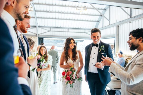 Spring brights & black tie for rustic glamour at The Barns at Lodge Farm. Essex documentary wedding photographer